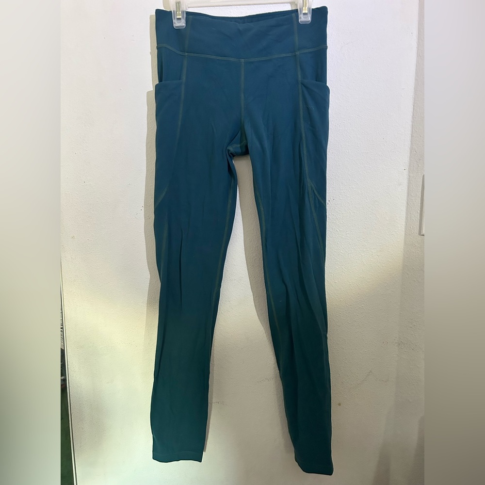 Blue leggings with side pockets